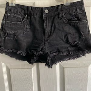 Black ripped jean shorts